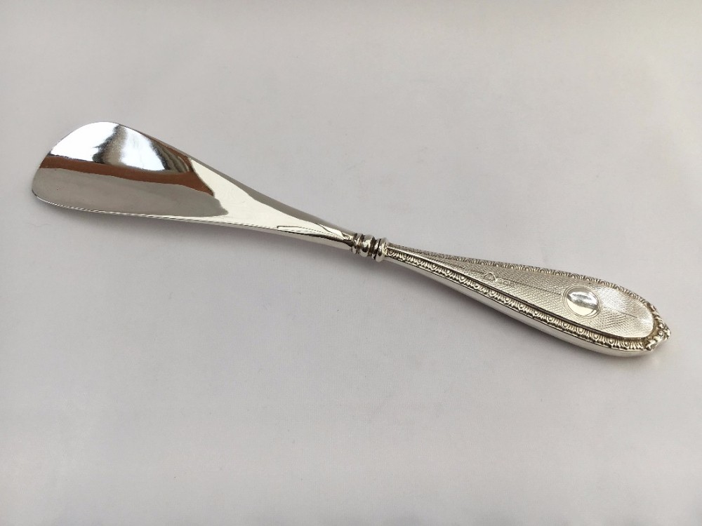 An handsome George V silver handled shoe horn.