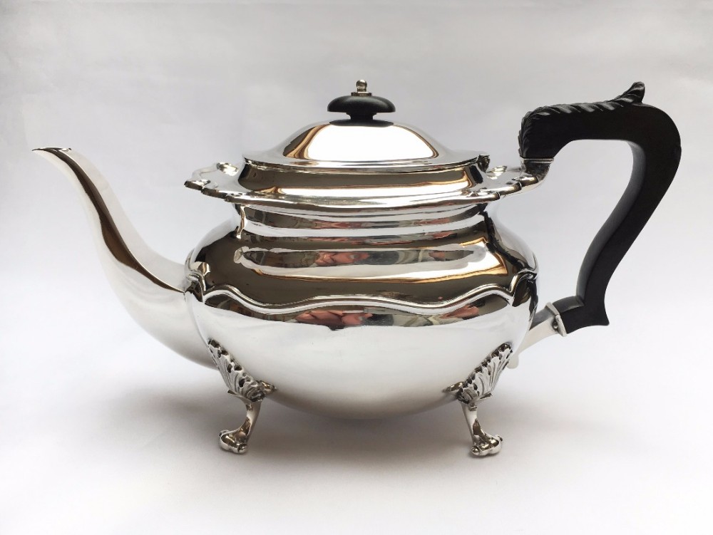 A fine quality silver breakfast teapot.