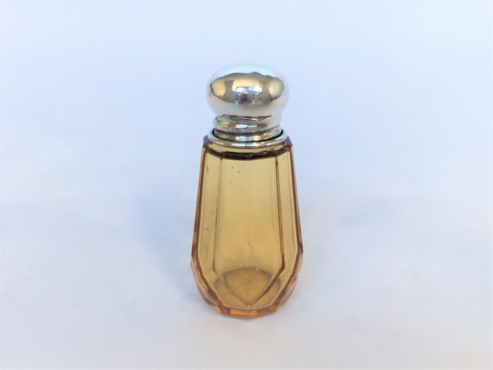 A delightful silver mounted amber perfume.