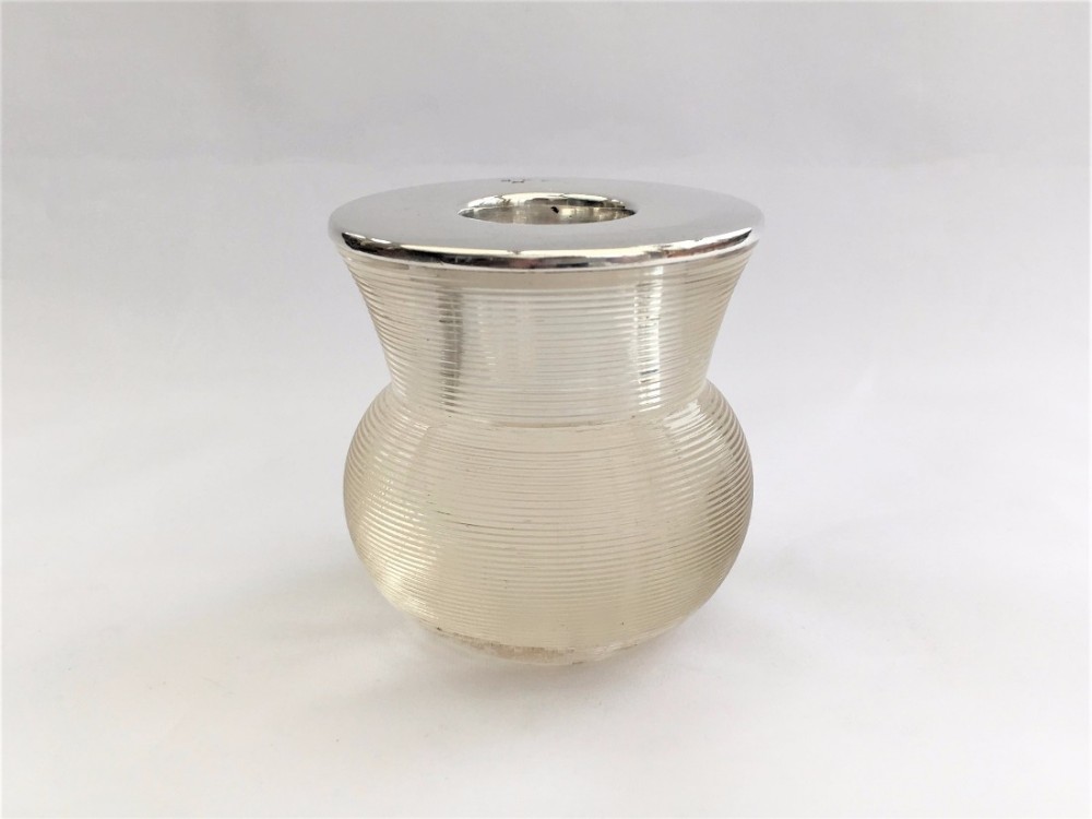 A novelty Victorian silver mounted thistle match striker.