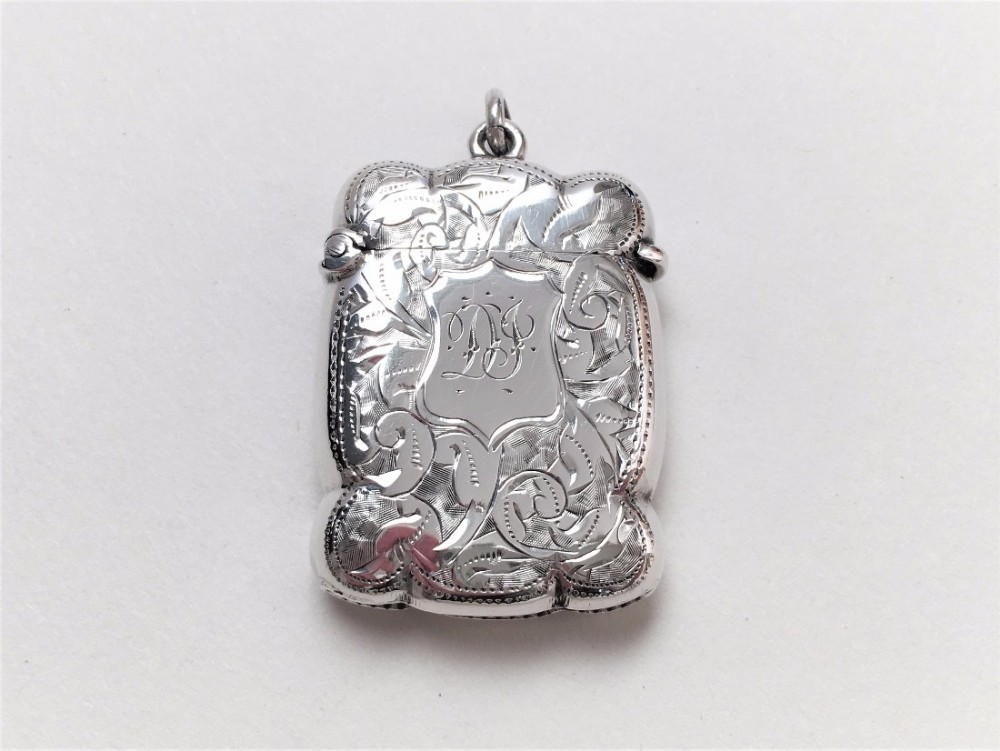 A charming Victorian silver vesta with gilded interior.