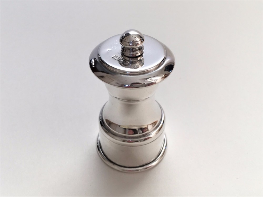 A fine Victorian silver pepper grinder.
