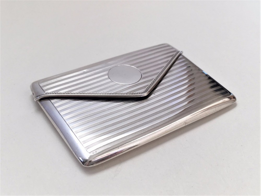 An elegant George V silver card case.