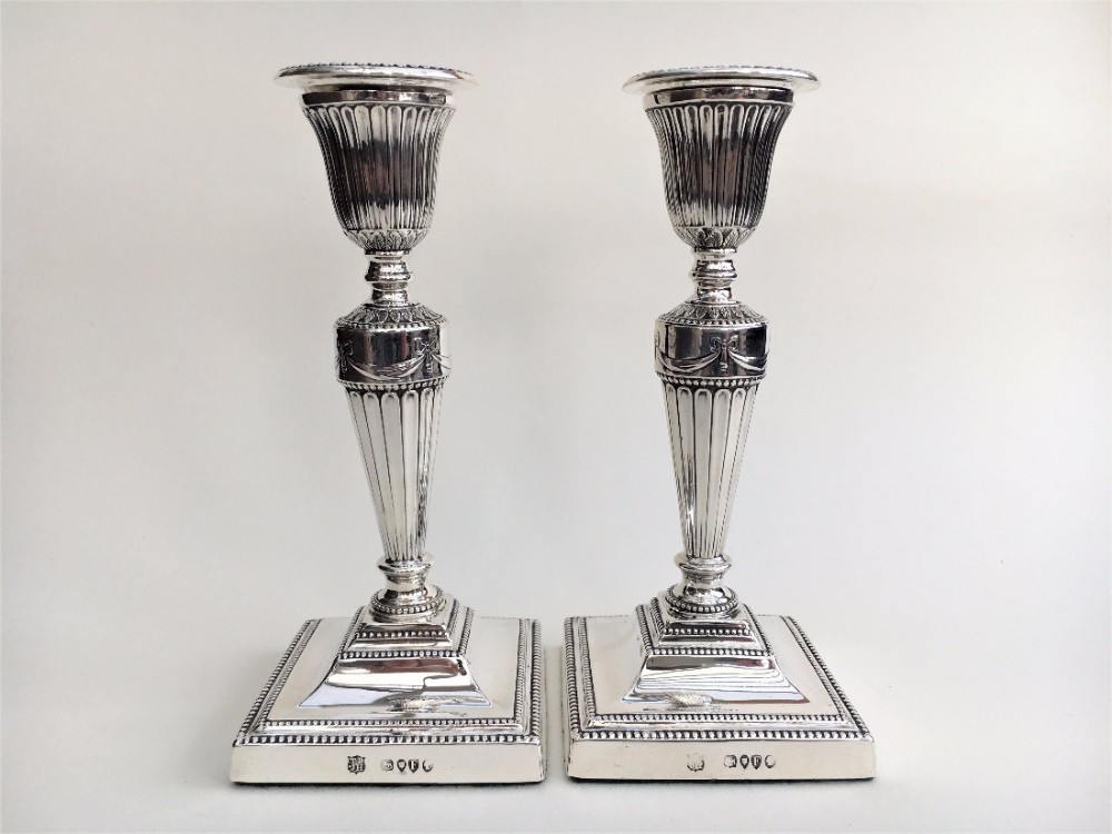 A fabulous pair of Victorian silver half height candlesticks.