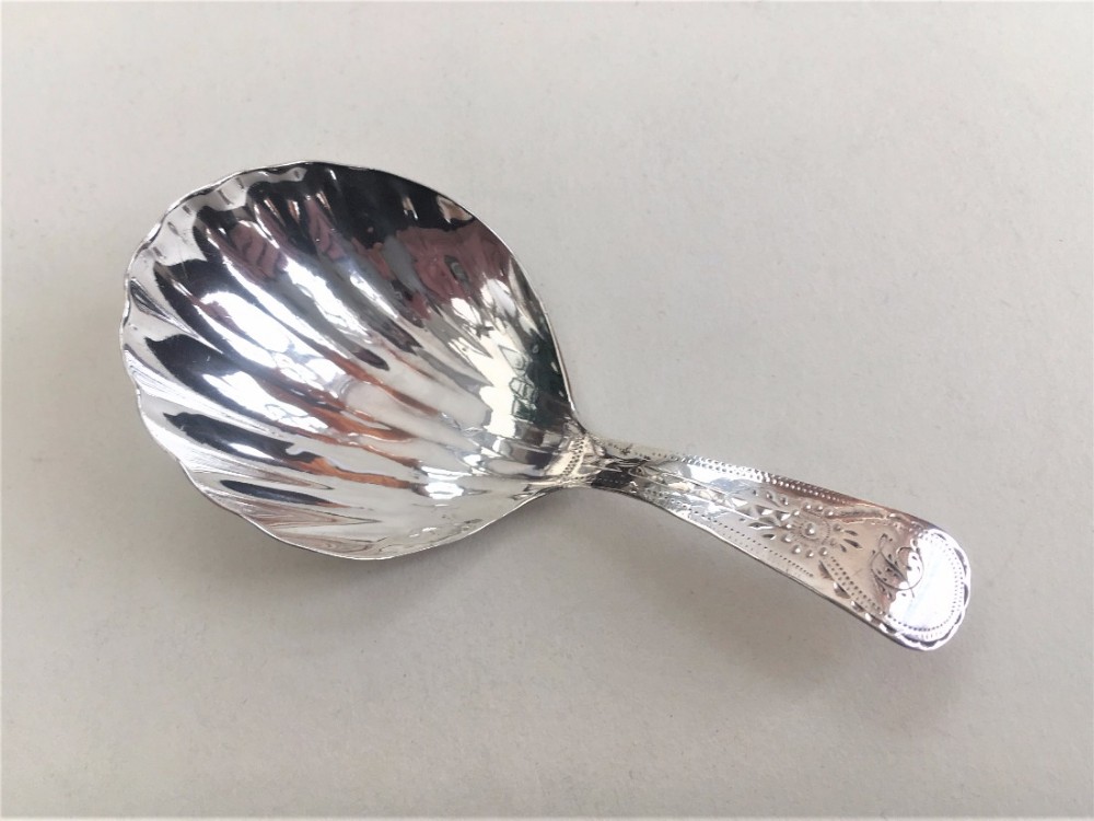 An 18th Century silver caddy spoon.
