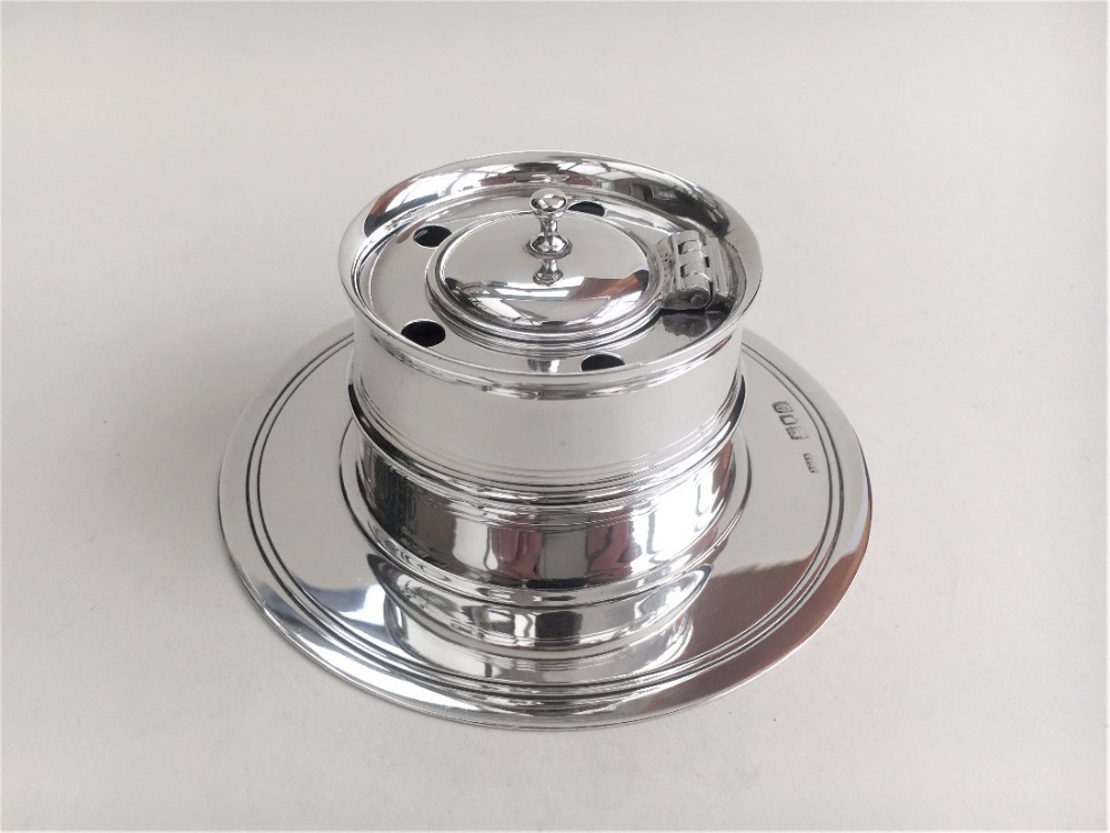 A marvellous Edwardian silver 'Fishing reel' inkwell. 
