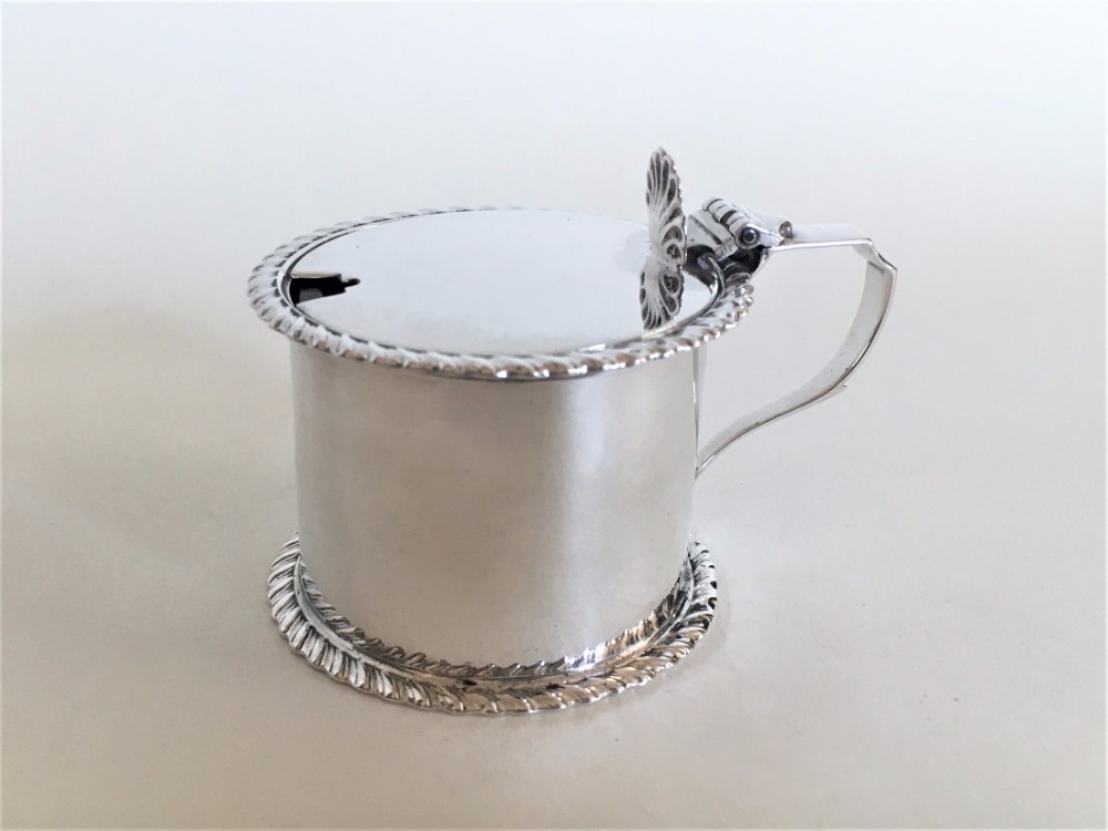 An attractive silver drum mustard pot.
