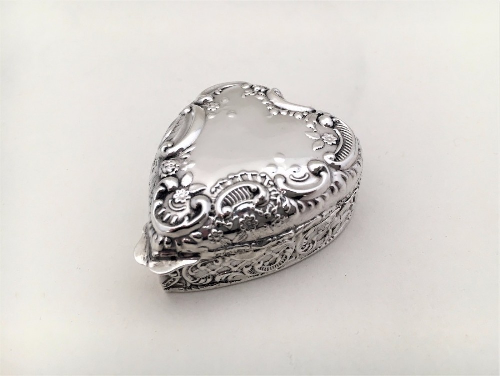 A delightful Edwardian heart shaped silver pillbox.