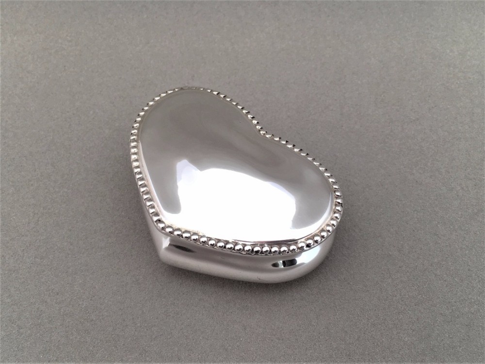A Victorian Silver Heart Shaped trinket Box.
