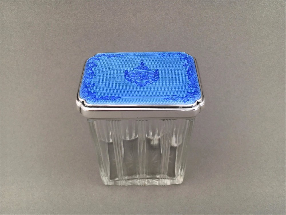 A Stunning Silver and Guilloche enamel dressing table jar.