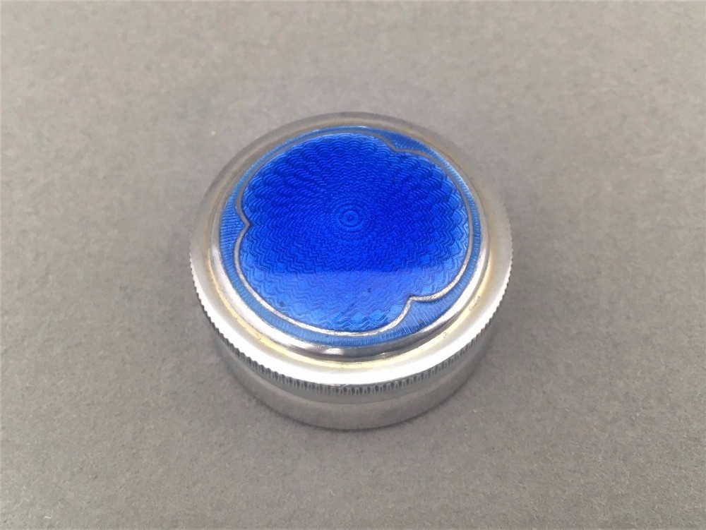 An exquisite silver and Guilloche enamel pill box.