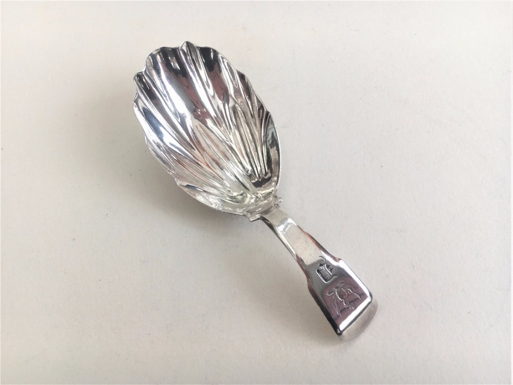 A Georgian silver caddy spoon.