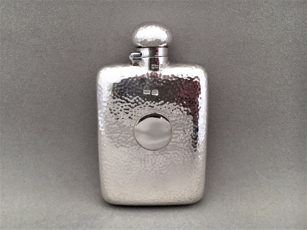 A handsome Arts and Crafts Victorian silver hip flask.