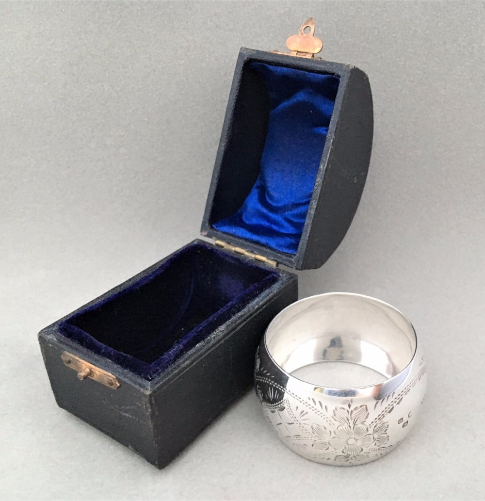 A handsome boxed Victorian silver napkin ring.