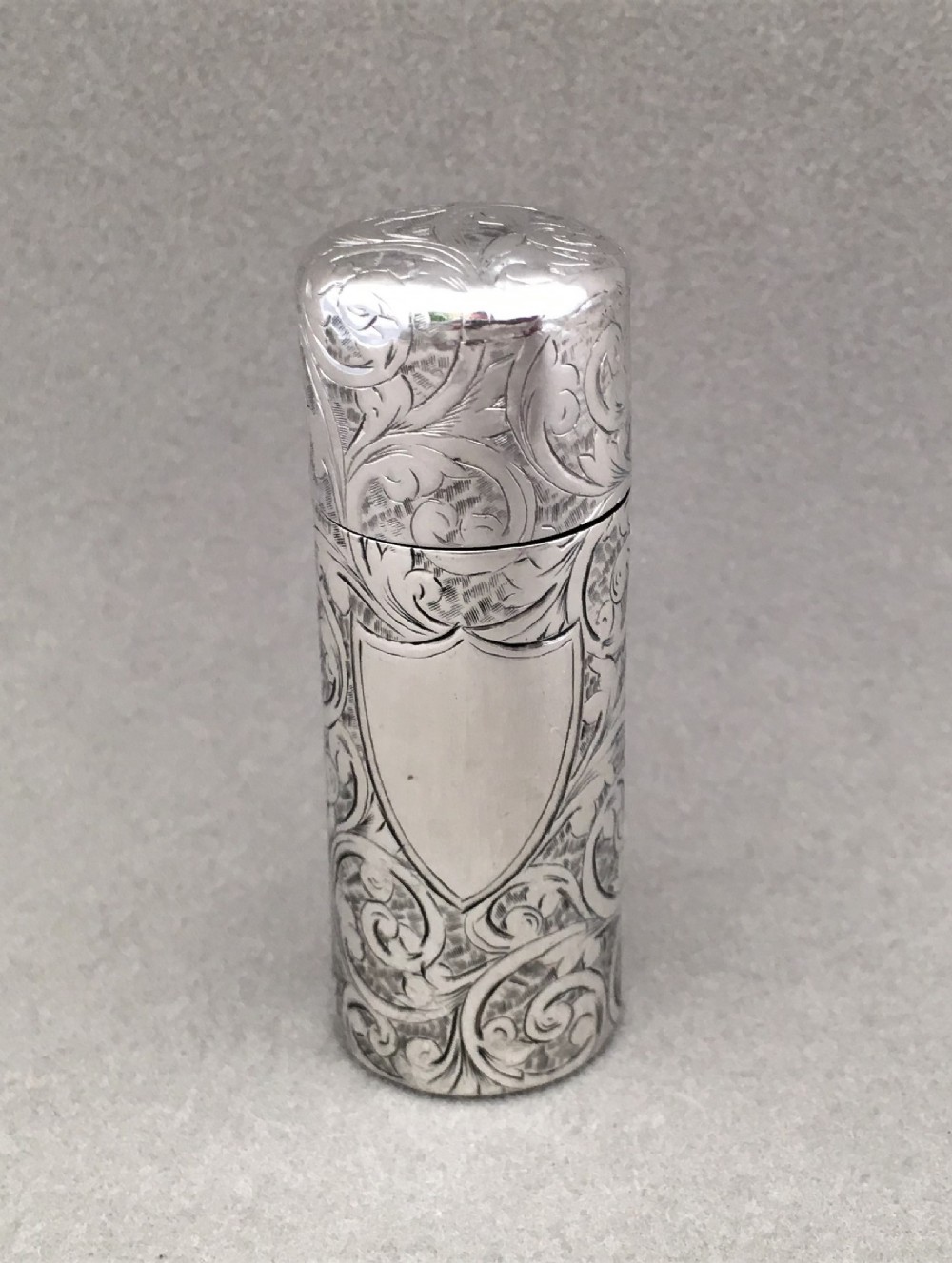 A late Victorian all silver scent bottle.