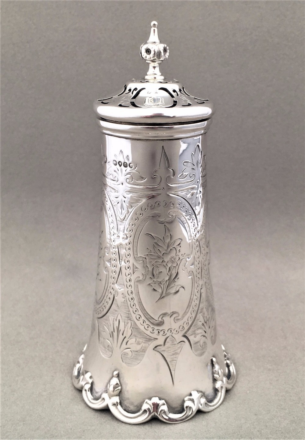 A Stunning Mid Victorian Silver sugar caster.
