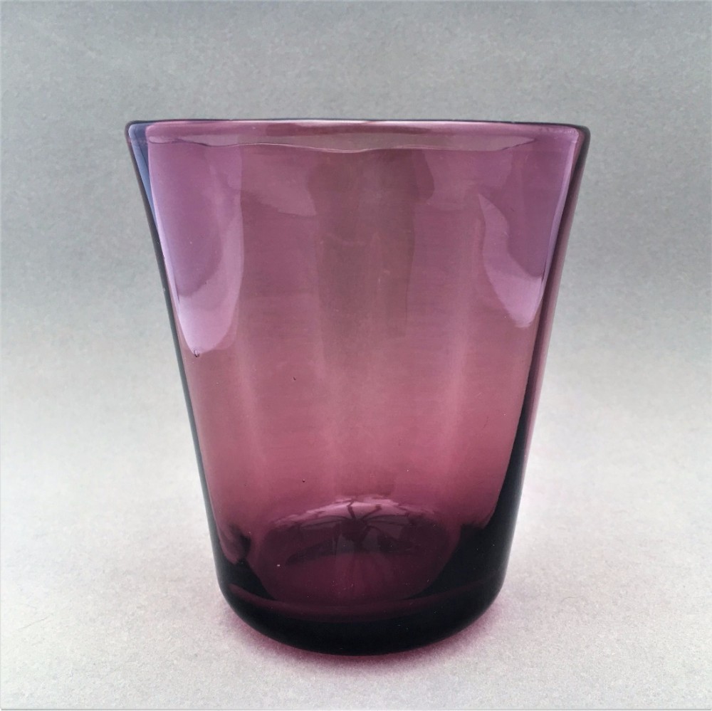 A large Victorian amethyst glass tumbler.