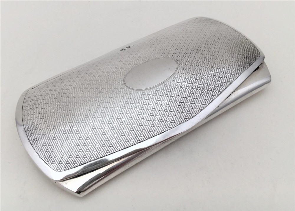  A Stylish George V silver glasses case.