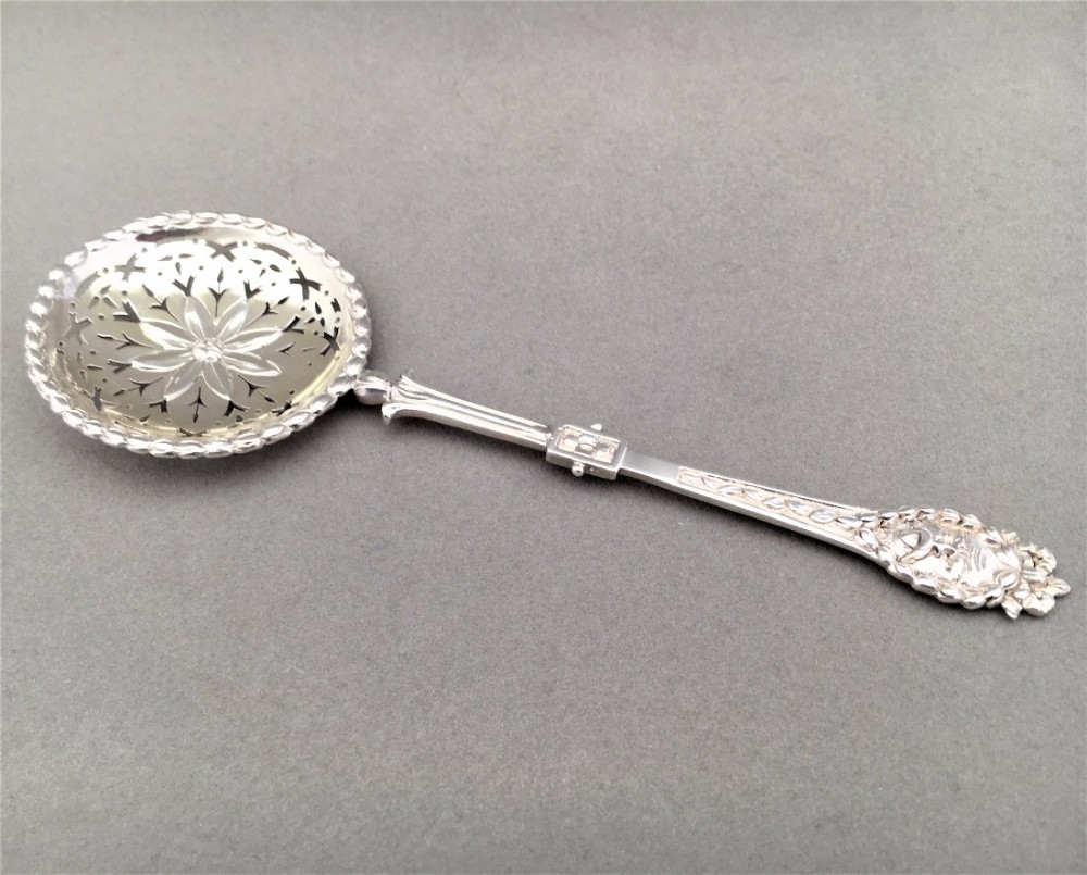 A rare John Figg Victorian silver sifter spoon.