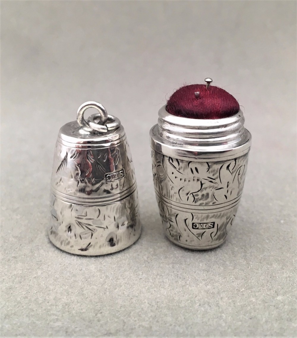 An unusual cased Victorian silver pin cushion. 
