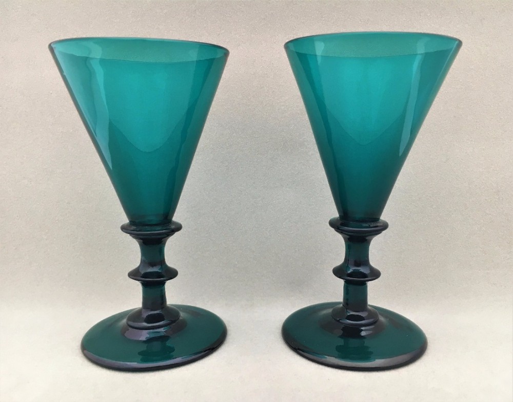 A pair of William IV green wine flutes.