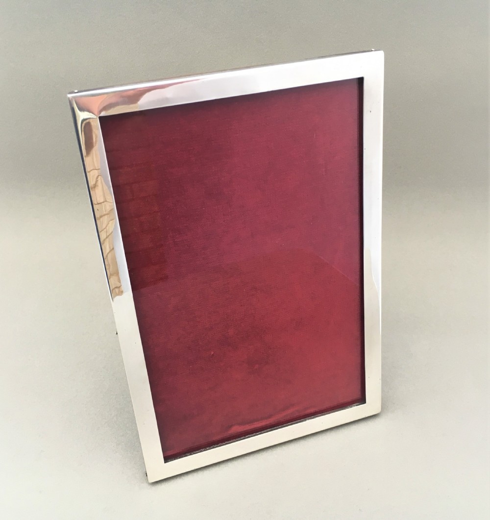 A handsome George V silver photo frame.