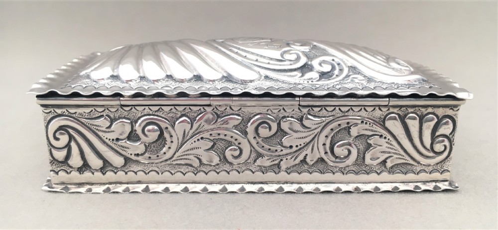 A Victorian repoussé silver trinket box. View III