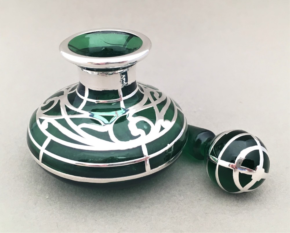 A stunning Victorian silver overlay glass scent bottle View III