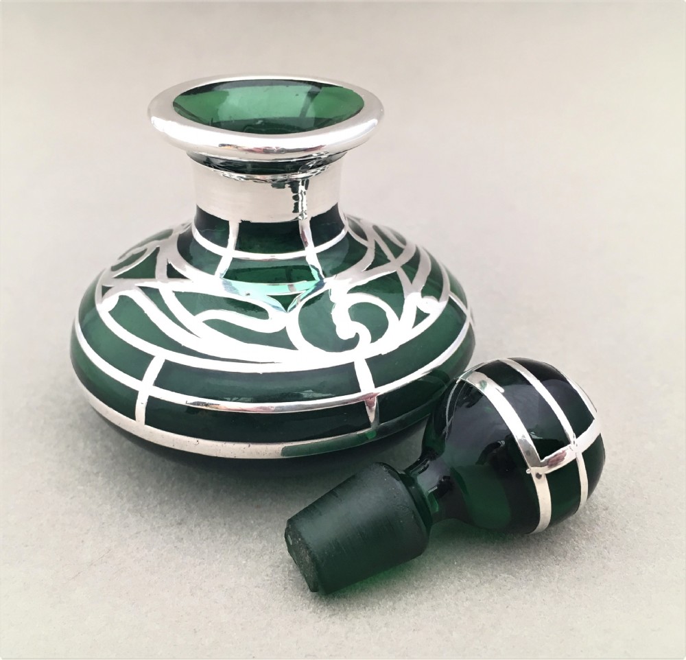 A stunning Victorian silver overlay glass scent bottle View IV