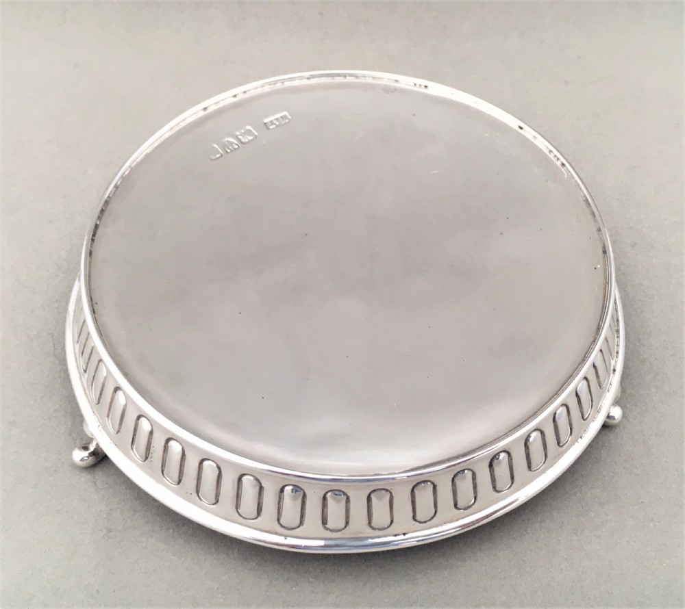 A Victorian Chester silver teapot stand or coaster.