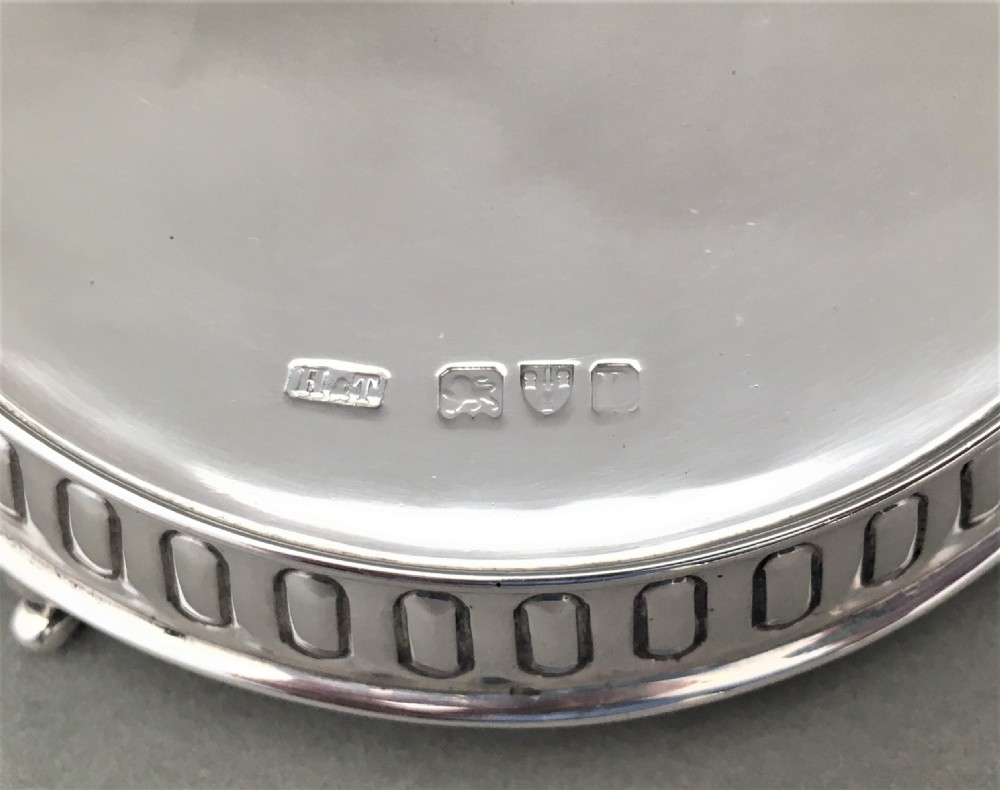 A Victorian Chester silver teapot stand or coaster. View V