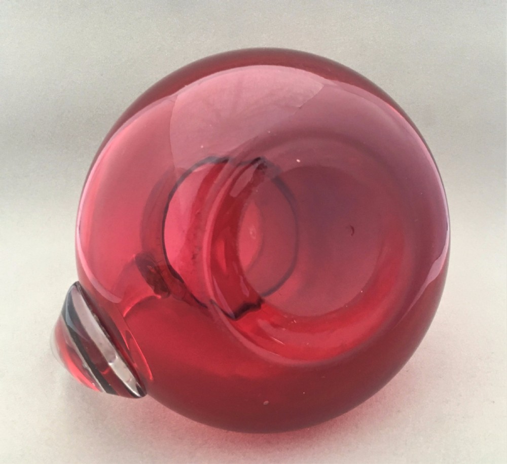 A Victorian Cranberry water jug. View V