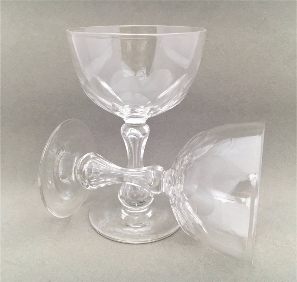 A pair of Victorian cut glass champagnes.