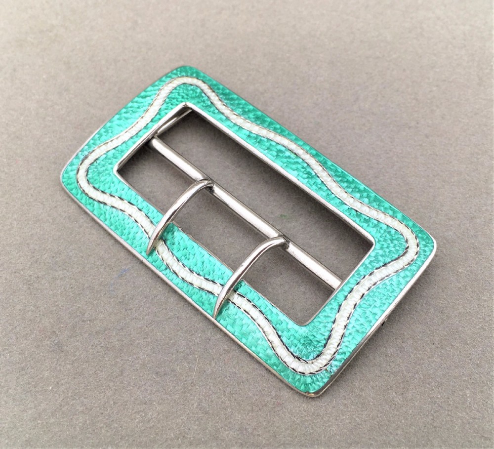 A stunning silver and guilloche enamel belt buckle.