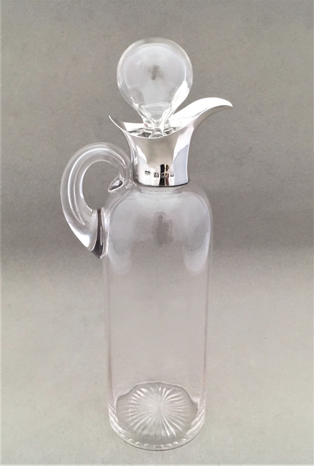 A Charming Edwardian Silver mounted oil or vinegar bottle.