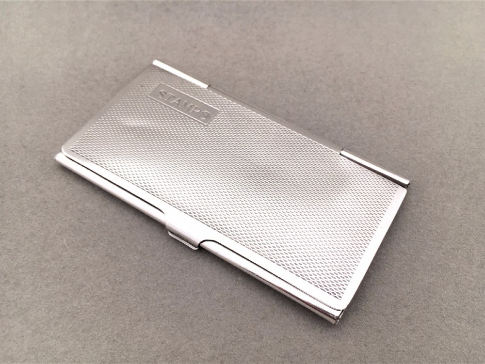 An Excellent silver triple stamp case View II