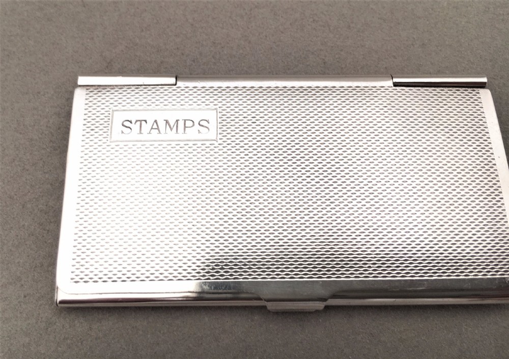 An Excellent silver triple stamp case View III