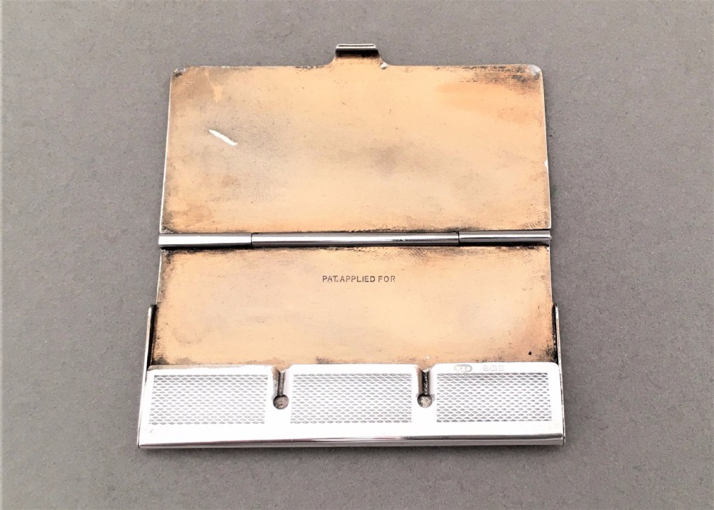 An Excellent silver triple stamp case View VII