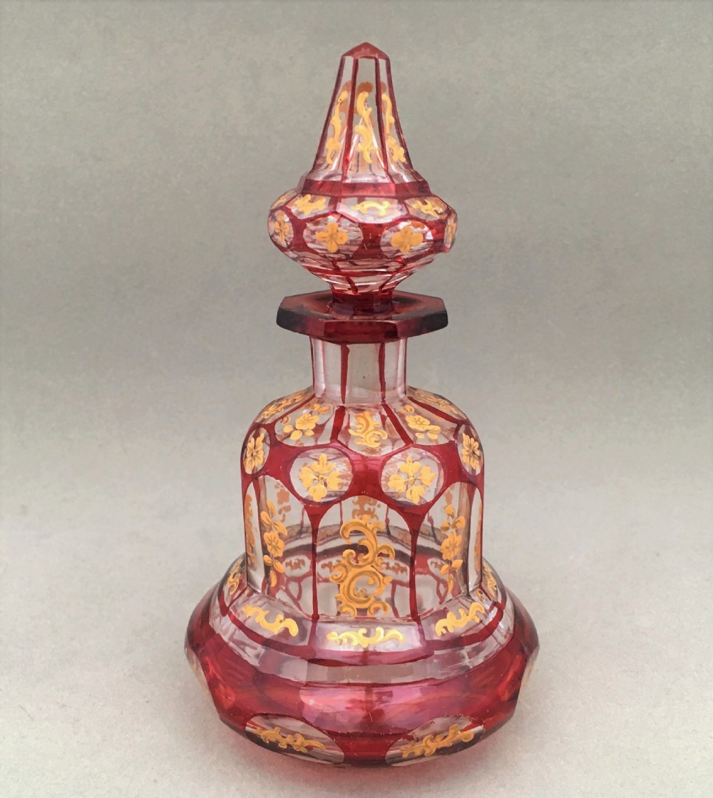 An exquisite French gilded ruby scent bottle