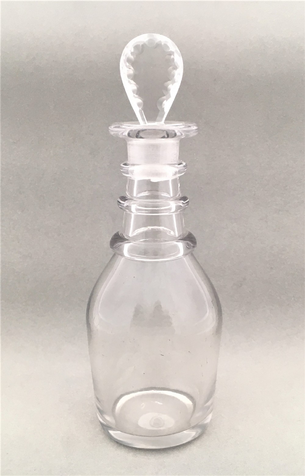 An unusual small Georgian liqueur decanter