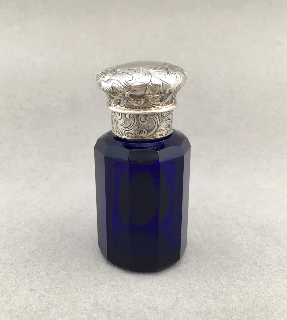An unusual Victorian silver mounted Scent bottle