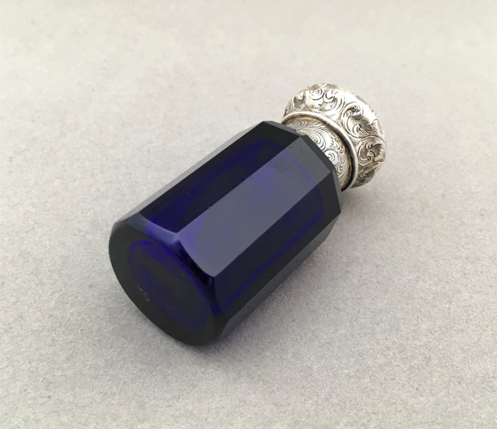 An unusual Victorian silver mounted Scent bottle View III