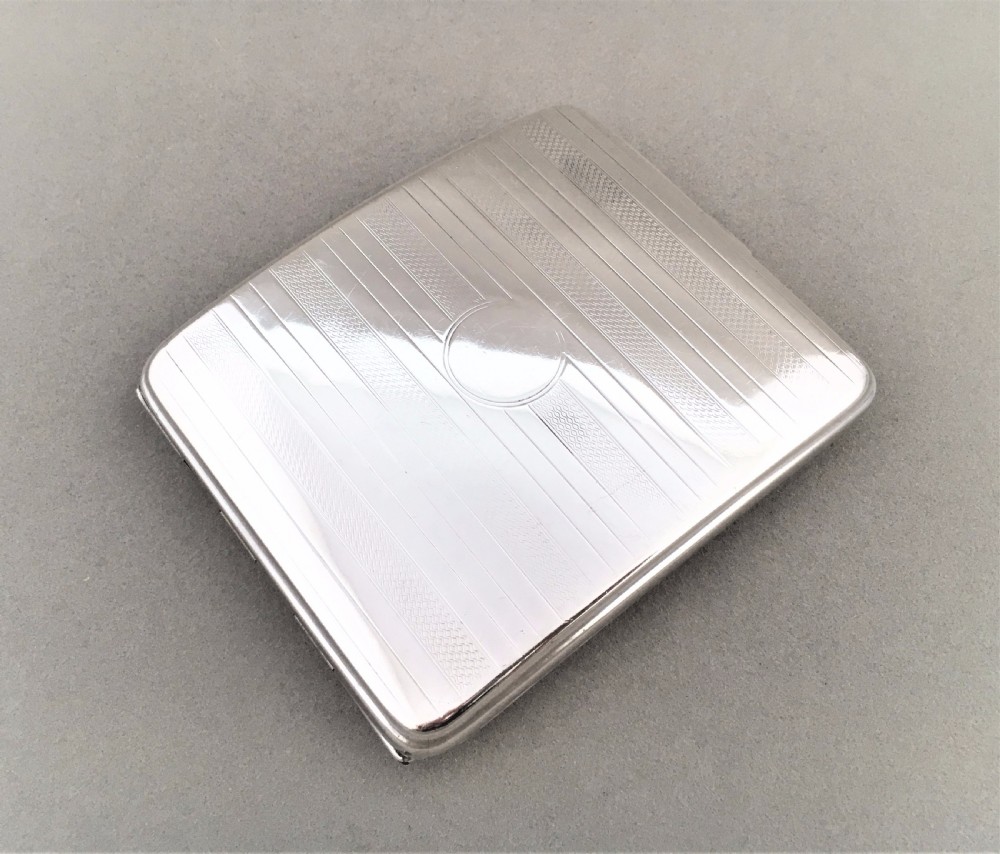 A handsome Art Deco silver cigarette case View II