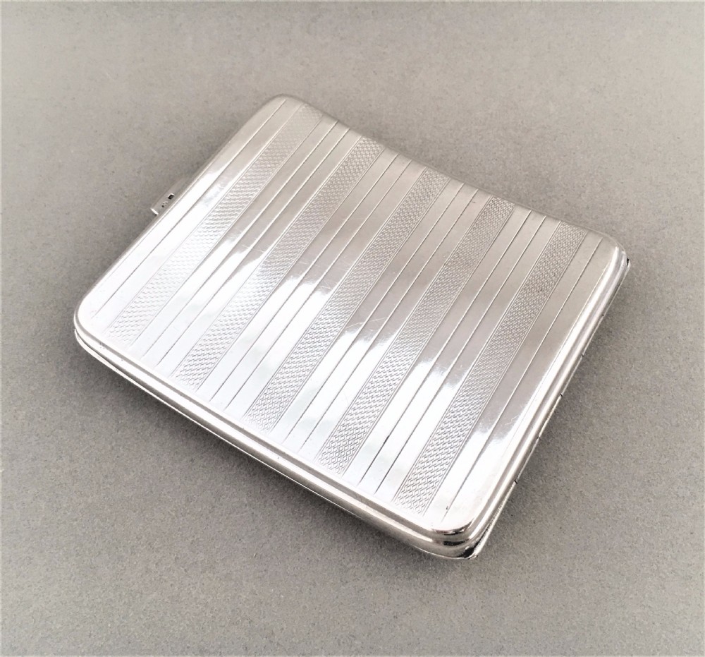 A handsome Art Deco silver cigarette case View III