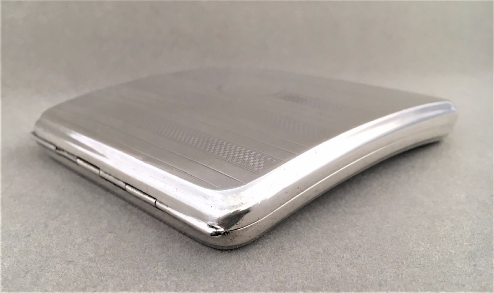 A handsome Art Deco silver cigarette case View IV