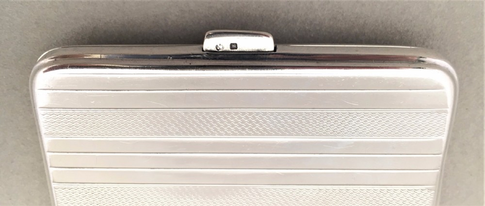 A handsome Art Deco silver cigarette case View VI