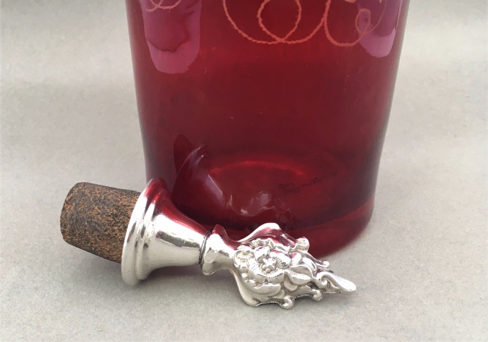 A Charming Victorian fruiting vine etched decanter with silver plated stopper View V