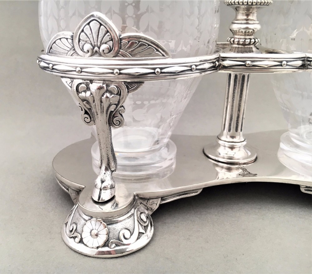 An exquisite Victorian Elkington silver plated preserve jar stand with etched jars View II