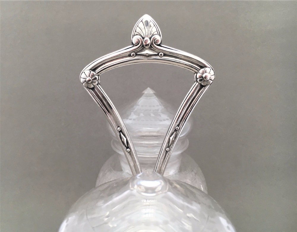 An exquisite Victorian Elkington silver plated preserve jar stand with etched jars View IV