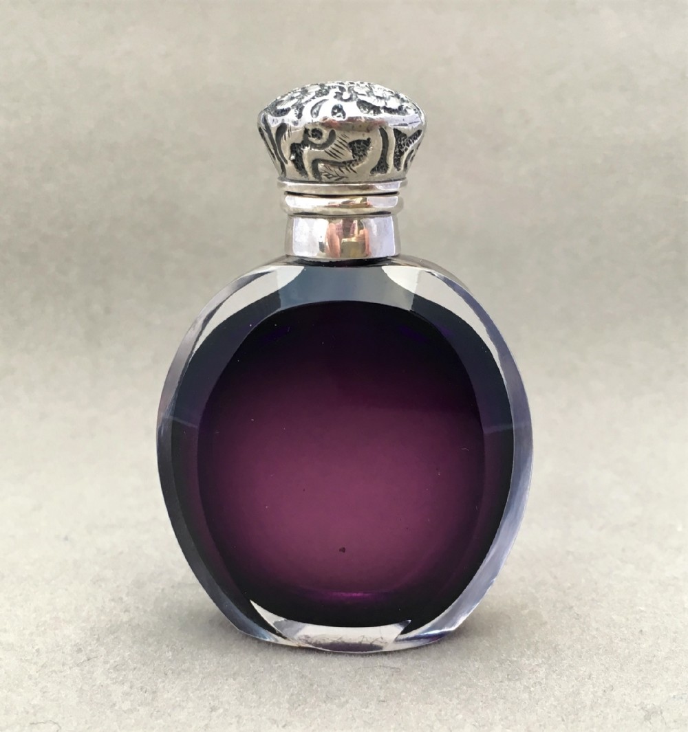 A charming Amethyst silver mounted scent bottle